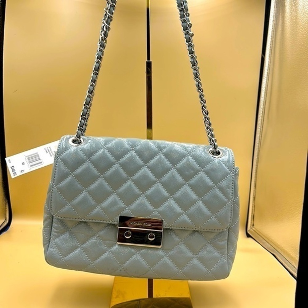 NWT Michael Kors Sloan bag approx 11 wide and 9 inches tall. Dusty blue